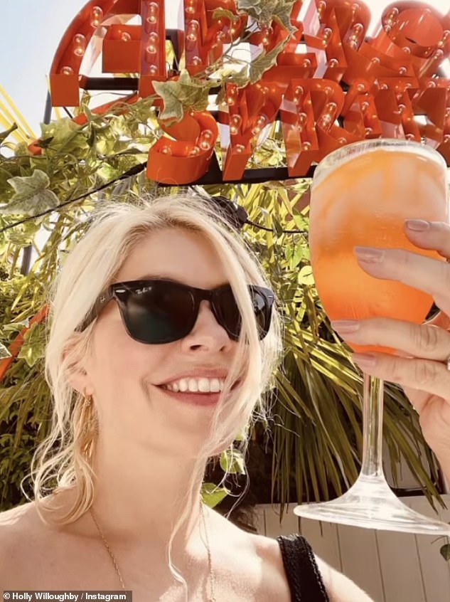 Holly Willoughby slips into a swimsuit and sips on Aperol and makes pizza in the garden