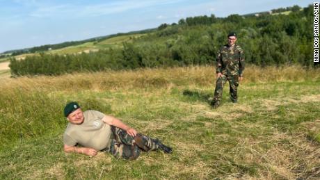 Vytas Grudzinskas and a fellow volunteer are seen on a hill in the Suwalki Corridor.