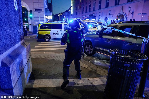 ‘Iranian-Norwegian’ terrorist kills two in attack on gay bar: Moment suspect is arrested