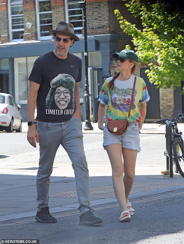 Isla Fisher steps out with husband Sacha Baron Cohen in London