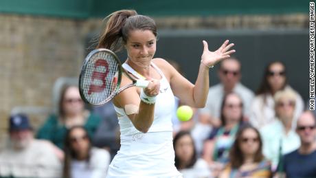 Burrage plays a forehand during her first round match against Tsurenko.