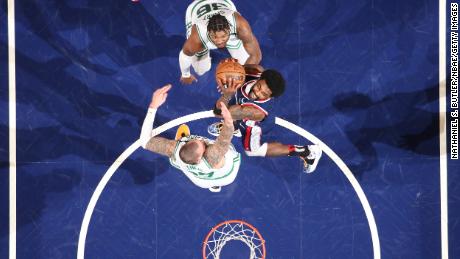 Irving drives to the basket against the Celtics during the 2022 NBA Playoffs.