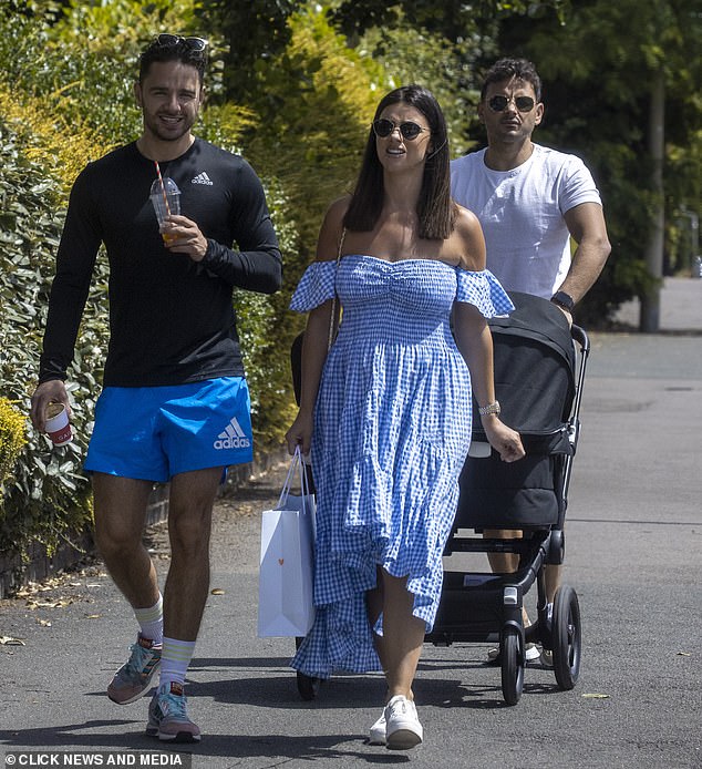 Lucy Mecklenburgh enjoys a sunny stroll with fiancé Ryan Thomas and his brother Adam