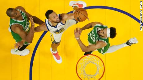 Curry shoots during the first half of Game 2 against the Boston Celtics.