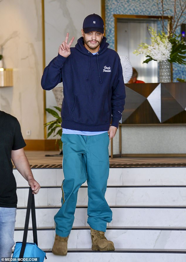 Pete Davidson strolls around Cairns with his zipper undone