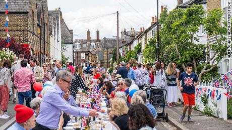 Residents in Wimbledon village, southwest London, hold a jubilee street party -- one of thousands to be held by communities across London and the United Kingdom over the weekend.