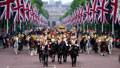 Soldiers parade during the Platinum Jubilee Pageant outside Buckingham Palace in London on Sunday.