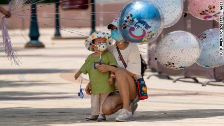 A child looks at balloons at the Shanghai Disneytown on June 16, 2022 in Shanghai, China.