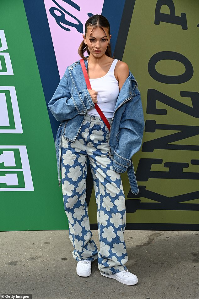 Thylane Blondeau rocks double-denim ensemble at Kenzo show during Paris Fashion Week 