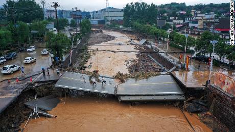 &#39;Once in a thousand years&#39; rains devastated central China, but there is little talk of climate change