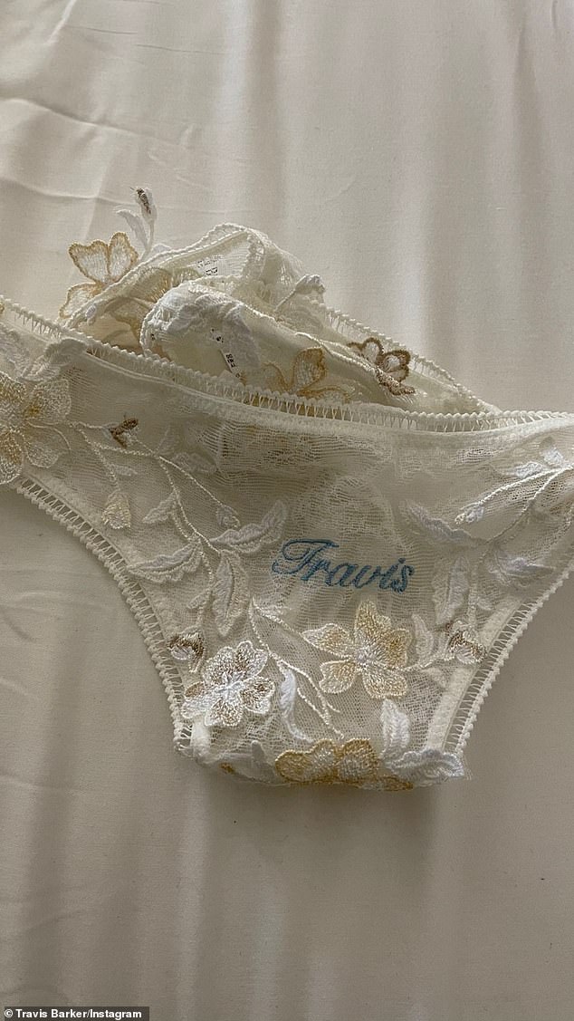 Travis Barker shows off wife Kourtney Kardashian’s VERY sexy lace underwear inscribed with his NAME