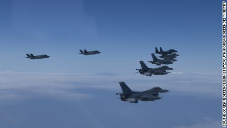 Fighter jets from the South Korean and US air forces fly over the Yellow Sea, or West Sea, on Tuesday morning.