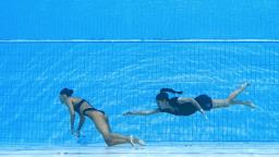 What the photos of the drowning elite swimmer show