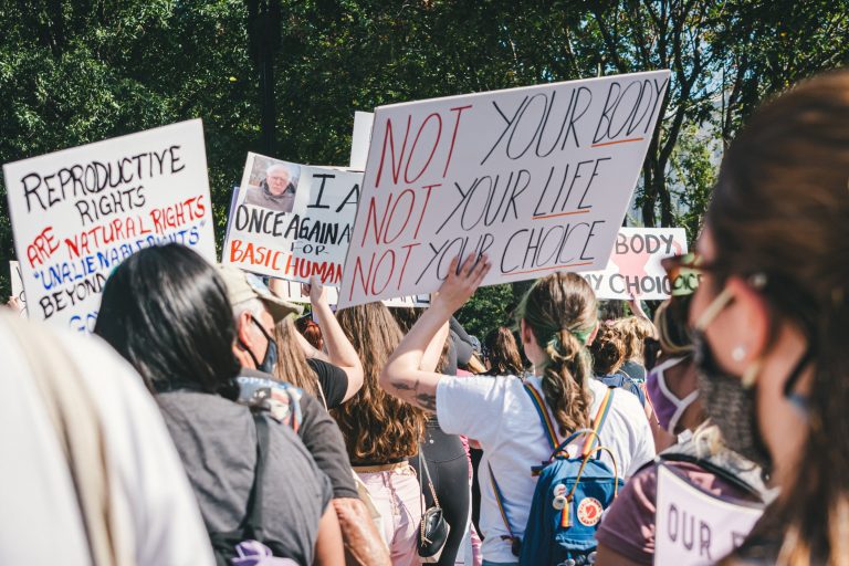 Overturning Roe v. Wade will put even more of an economic burden on women, says economist