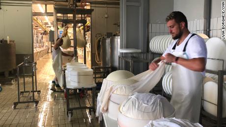 Production of  Parmigiano Reggiano cheese is seen at a site near Mantova.