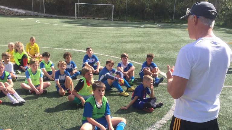 Former Wolves player Neil Edwards coaching children