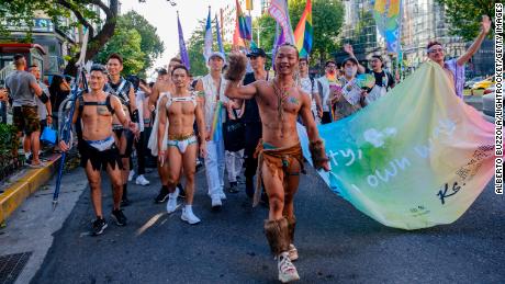 People take to the streets of Taipei during the city&#39;s annual Pride festival in 2020. The island has a progressive reputation in Asia, boosted by its legalization of same-sex marriage in 2019.