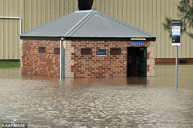 Floodwaters have hit Camden forcing thousands to flee the suburb in south-west Sydney