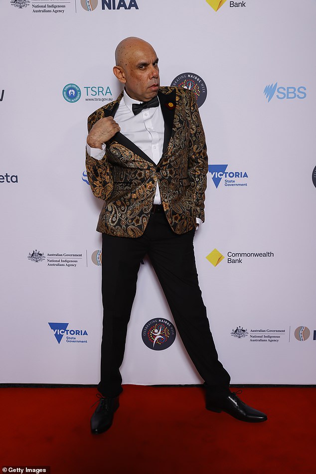 Actor and comedian Steven Oliver (pictured) hammed it up on the red carpet while showing off his ornate paisley jacket