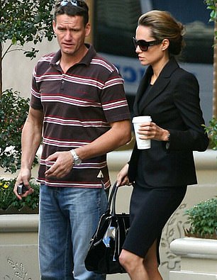 In safe hands: Mark Billingham protecting film star Angelina Jolie