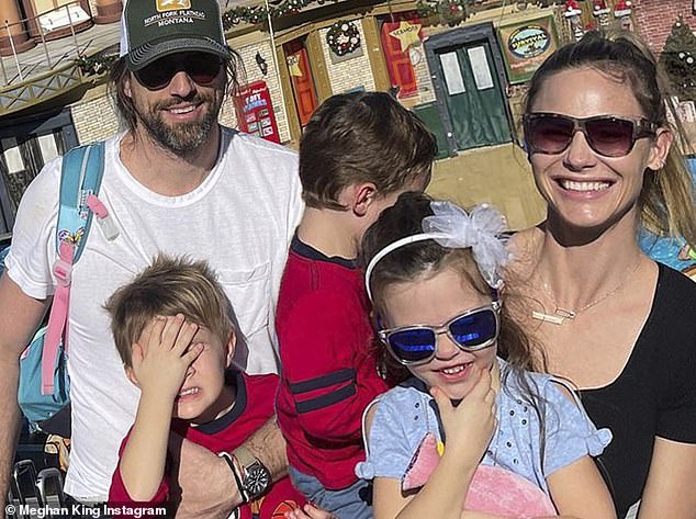 Family memories: Cuffe Biden Owens is seen pictured with Meghan and her three children from her previous marriage to former baseball player Jim Edmonds