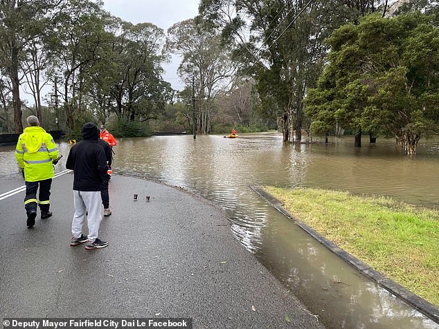 Winds have gradually eased overnight after gale force warnings were issued on Sunday (pictured, flooding in Fairfield western Sydney)