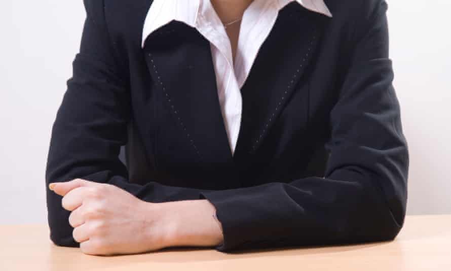 Close-up of a businesswoman sitting in an office