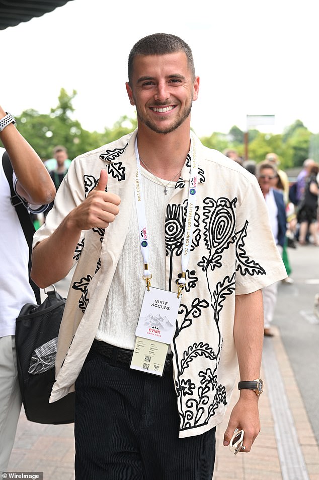 Funky: Mason looked stylish in a printed shirt and corduroy trousers