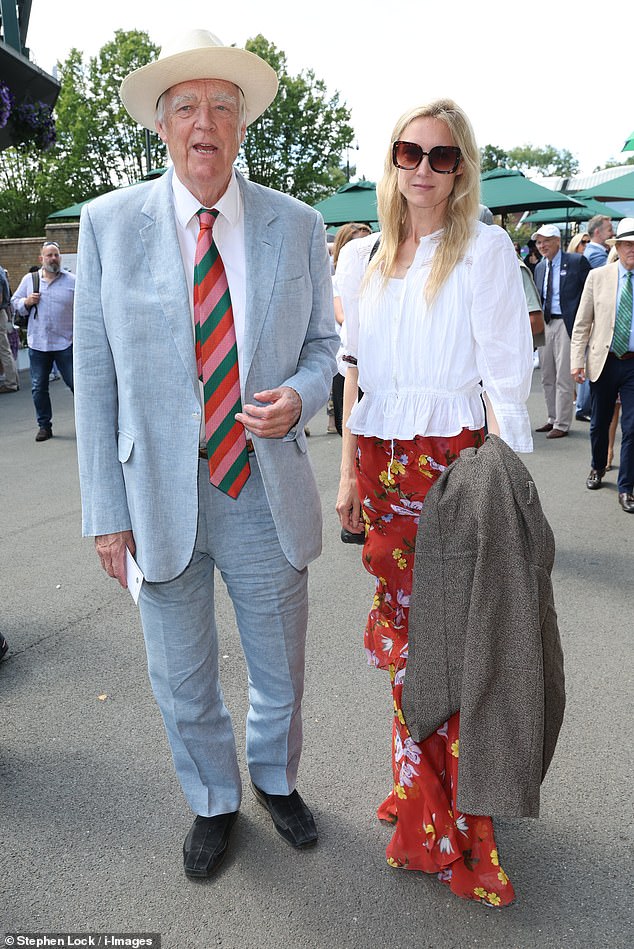 Dapper: Sir Tim wore a blue suit with a colourful green, red and pink tie