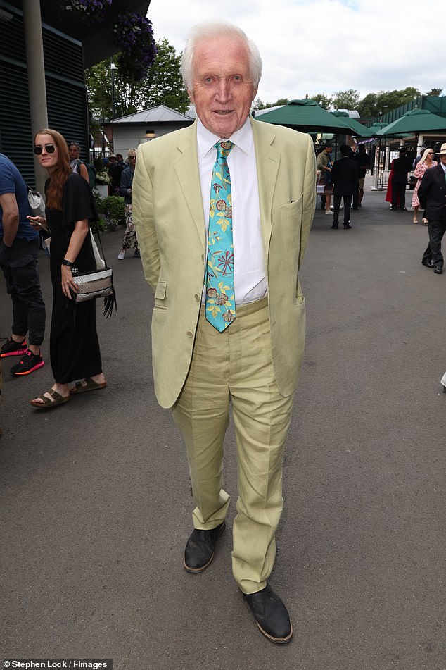 Arrivals: David Dimbleby opted for a yellow suit with a vibrant blue tie