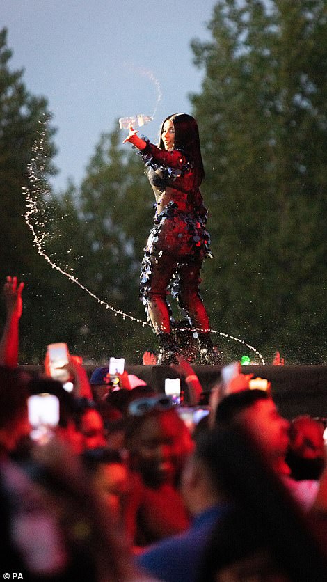 Sharing is caring: Before she threw the drink into the audience