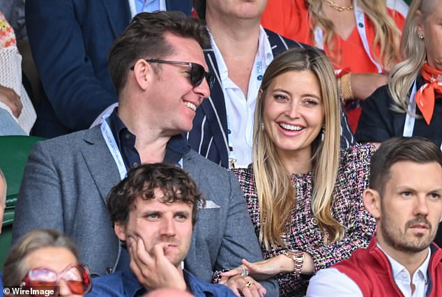 After making their way inside, the couple sat together in the stands and appeared enthralled by the match