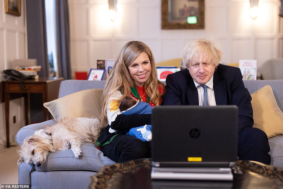 It emerged this week that the cost of Mr Johnson's renovations of the Downing Street flat was more than £200,000. It included £2,250 worth of 'gold' wallpaper which he had complained about his wife Carrie Johnson buying. Above: The couple in Downing Street