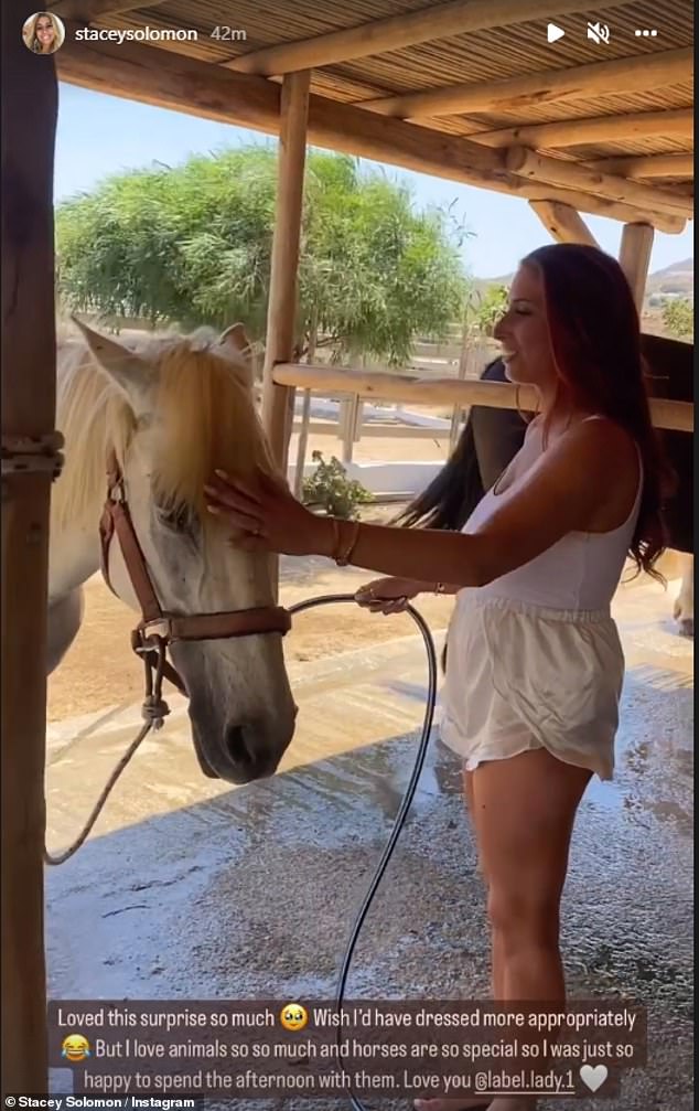 Caring: The animal lover also included an image of herself in the montage cooling the horse down with a hose as she stroked his forelock