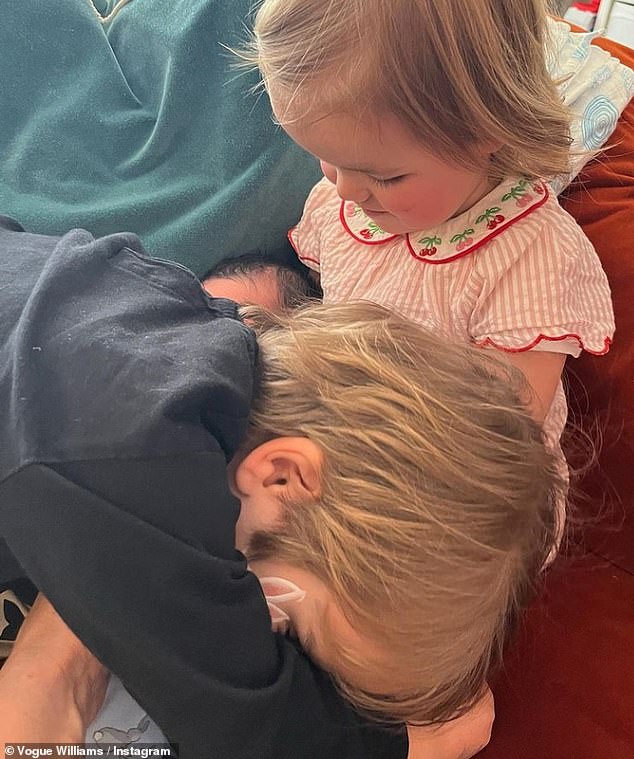 Sweet: The happy couple took to Instagram in April to share the wonderful news, sharing a photo of their older children meeting their new sibling