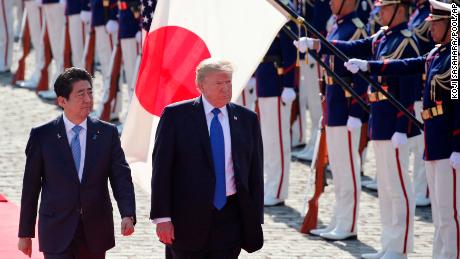 Abe escorts then President Donald Trump during a welcome ceremony at Akasaka Palace, Nov. 6, 2017.