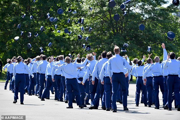 The overall crime rate in Queensland has shot up five per cent in the past year with robberies up 33 per cent, assaults jumping 69 per cent, sexual crime increasing 14 per cent and break-ins surging 23 per cent. Pictured: Queensland Police recruits graduating