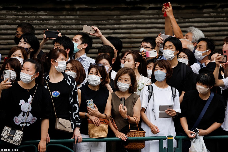 Thousands of people lined the route that Abe's hearse was due to pass along during his funeral today, as they bid a final farewell to the country's longest-serving prime minister