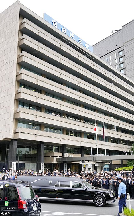 Abe's hearse in front of Liberal Party HQ