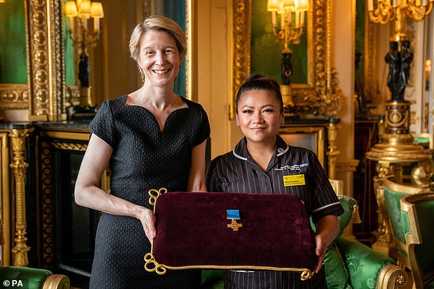 Amanda Pritchard and May Parsons, Modern Matron at University Hospital Coventry and Warkwickshire, after being presented with the George Cross, which will now go on a tour of the NHS