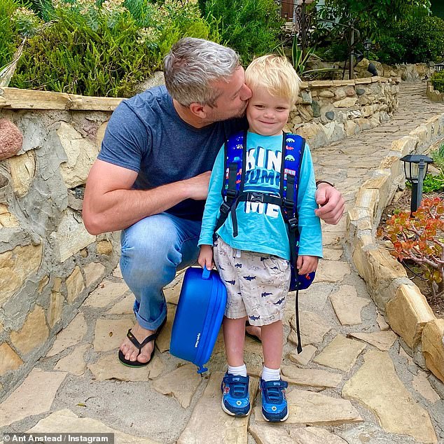 All ready: 'Special first day for Hudzo at his new summer school…!' he wrote. 'This has been building up the past few days from him precisely choosing his new lunch box to exactly what he wants to wear today! (Of course he had to carry it the whole way!)