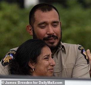 The heartbreaking image of Felix Rubio comforting his wife, Kimberly, was beamed across the world in the aftermath of the shooting