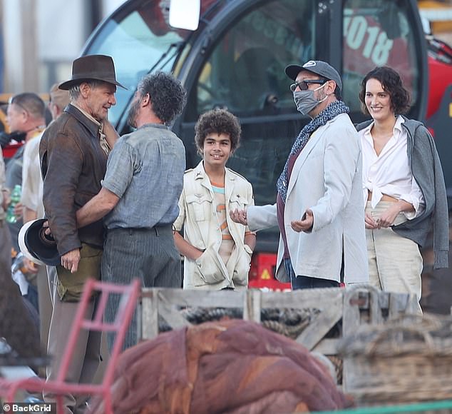 In the can: After being delayed a year by the COVID-19 pandemic, the shoot for the still untitled fifth Indy movie eventually kicked off in June 2021, and wrapped principal photography this past February; Ford is pictured with co-star Antonio Banderas