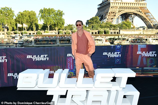 Dashing: The 58-year-old acting legend put on an eye-catching display in a vibrant orange blazer, matching trousers and a t-shirt