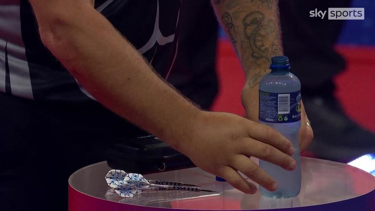 Price was seen placing his water bottle very specifically on the table at the start of his match against Martin Schindler