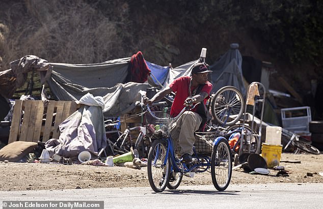 Our cameras saw people living in tents, RVs, pushing around shopping carts with their entire lives in them and more in the city under Interstate 80