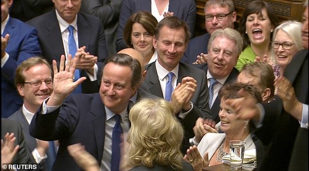 Like Mrs May, her predecessor David Cameron was also given a standing ovation by MPs at the end of his final PMQs