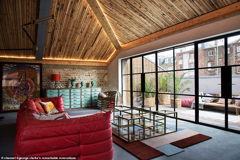 James and his Spanish girlfriend Ellie appear on the Channel 4 programme tonight where he revealed he bought the empty shell of the former 1818 stables for £660,000 in 2015 (pictured, the living room on the third floor of the property)