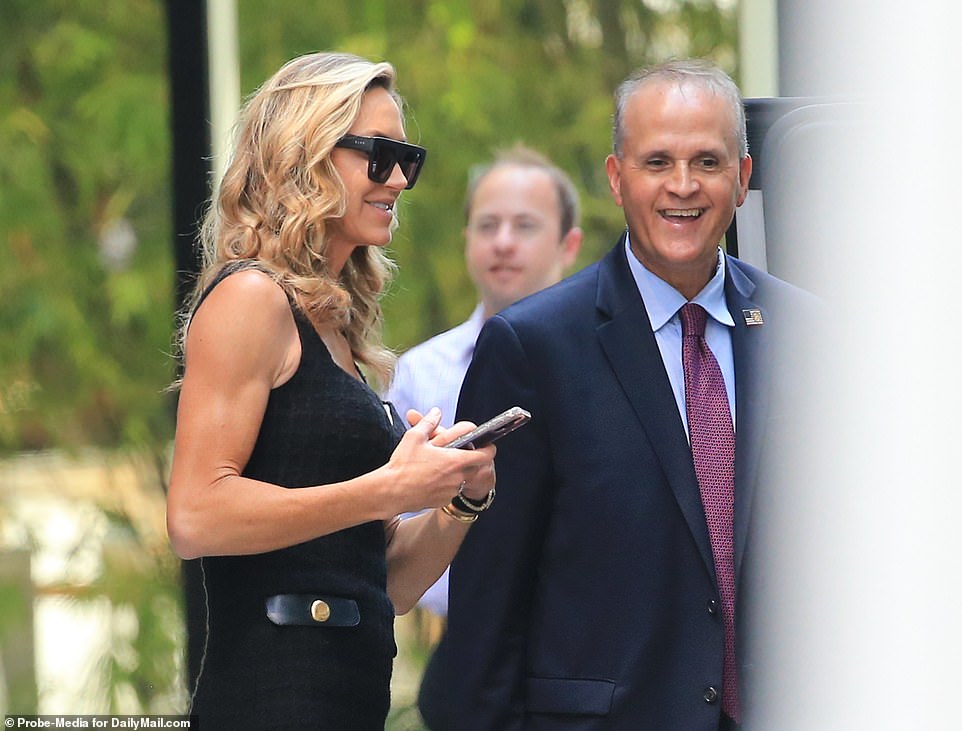 Lara was in high spirits outside Trump Tower before she and the rest of the family made their way to the funeral home