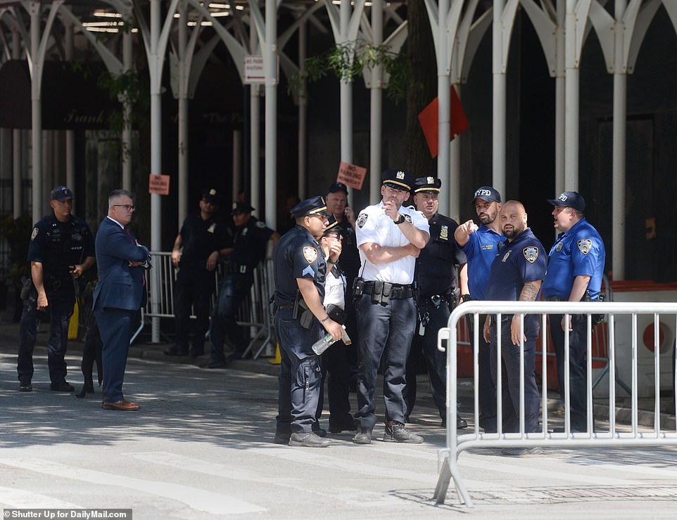 NYPD officers making arrangements outside the funeral home where Ivana Trump remains were held before the funeral